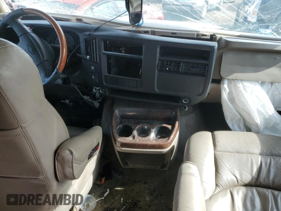 2004 Chevrolet Express Passenger z VIN 1GBFG15T041144358, wystawiony jako Copart lot #45413355 z przebiegiem Nie podano mil oraz Szkoda całkowita • Salvage title. Historia ofert i sprzedaży dostępna na DreamBid. Obrazek 8.