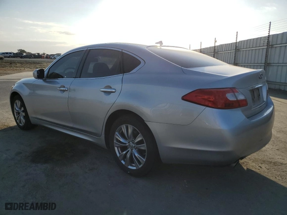 2012 Infiniti M37 with VIN JN1BY1AP9CM336121, listed as a Copart auction lot 71656374 with 125,497 mi miles and Salvage Title. Bid and sale history available at carsss.com. Image 2.