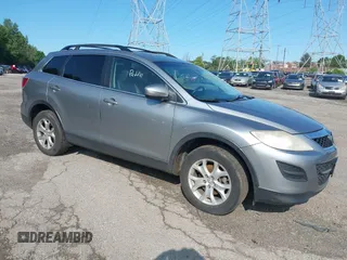 2012 Mazda CX-9 Touring z VIN JM3TB3CV7C0365934, wystawiony jako IAAI lot #42381671 z przebiegiem 237 298 mil mil oraz . Historia ofert i sprzedaży dostępna na DreamBid. Obrazek 1.