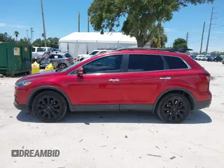 2015 Mazda CX-9 Grand Touring с VIN JM3TB2DA5F0464844, выставлен на аукционе IAAI как лот 42671898 с пробегом 164 165 миль миль и . История ставок и продаж доступна на DreamBid. Изображение 14.