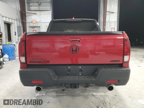 2021 Honda Ridgeline Sport with VIN 5FPYK3F10MB021380, listed as a Copart auction lot 48870685 with 52,317 mi miles and Salvage title. Bid and sale history available at DreamBid. Image 6.