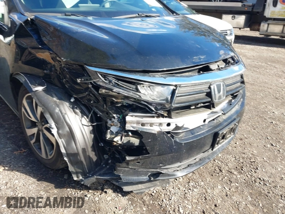 2024 Honda Odyssey Touring z VIN 5FNRL6H89RB042354, wystawiony jako IAAI lot #41469495 z przebiegiem 8 477 mil mil oraz . Historia ofert i sprzedaży dostępna na DreamBid. Obrazek 6.