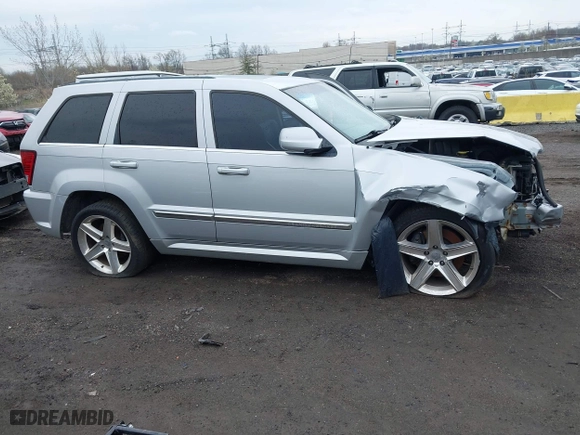 2007 Jeep Grand Cherokee SRT-8 with VIN 1J8HR78367C649237, listed as a IAAI auction lot 42019555 with 101,967 mi miles. Bid and sale history available at carsss.com. Image 13.