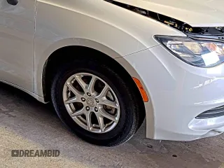 2017 Chrysler Pacifica Touring with VIN 2C4RC1DG5HR764942, listed as a IAAI auction lot 42255421 with 64,381 mi miles and . Bid and sale history available at DreamBid. Image 24.