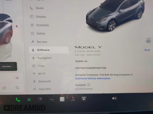2023 Tesla Model Y Long Range with VIN 7SAYGAEE8PF667728, listed as a IAAI auction lot 41839771 with 32,654 mi miles and . Bid and sale history available at DreamBid. Image 7.