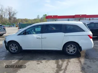 2011 Honda Odyssey EX-L with VIN 5FNRL5H6XBB059162, listed as a IAAI auction lot 42061378 with 164,317 mi miles and . Bid and sale history available at carsss.com. Image 14.