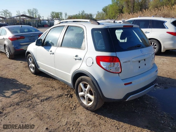 2007 Suzuki SX4 Man Touring Pkg AWD with VIN JS2YB417075101171, listed as a IAAI auction lot 41982543 with 124,205 mi miles. Bid and sale history available at carsss.com. Image 3.