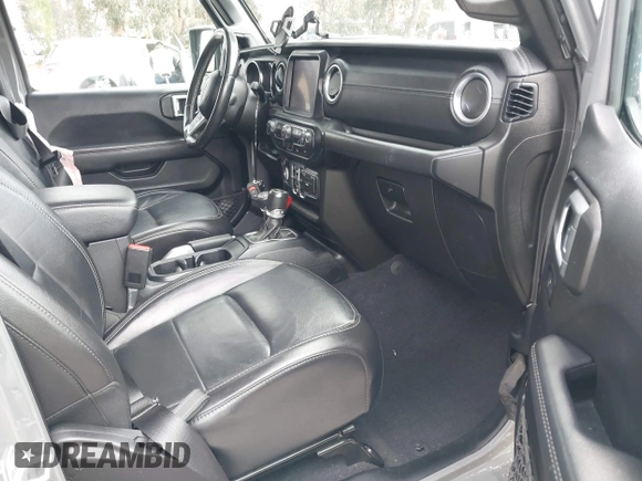 2021 Jeep Wrangler Unlimited Sahara with VIN 1C4JJXP64MW720263, listed as a IAAI auction lot 41514302 with 73,300 mi miles and . Bid and sale history available at DreamBid. Image 5.