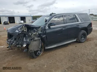 2015 Chevrolet Tahoe Commercial with VIN 1GNSK2EC1FR532676, listed as a Copart auction lot 77423094 with 173,747 mi miles and Salvage Title. Bid and sale history available at carsss.com. Image 1.