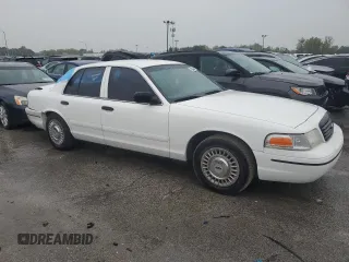 1999 Ford Crown Victoria Police with VIN 2FAFP71W7XX156457, listed as a Copart auction lot 71623954 with 123,313 mi miles and Salvage Title. Bid and sale history available at carsss.com. Image 4.