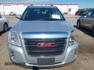 2014 GMC Terrain SLE z VIN 2GKFLRE37E6326485, wystawiony jako IAAI lot #42193314 z przebiegiem 167 209 mil mil oraz . Historia ofert i sprzedaży dostępna na DreamBid. Obrazek 13.