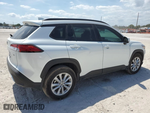 2024 Toyota Corolla Cross LE with VIN 7MUCAAAG7RV090677, listed as a Copart auction lot 57615565 with 6,910 mi miles and Salvage title. Bid and sale history available at DreamBid. Image 3.