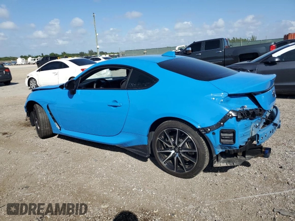 2023 Toyota GR86 with VIN JF1ZNBC11P8758861, listed as a Copart auction lot 77705634 with 11,684 mi miles and Salvage Title. Bid and sale history available at carsss.com. Image 2.
