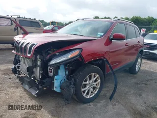 2015 Jeep Cherokee Latitude z VIN 1C4PJMCS0FW534959, wystawiony jako IAAI lot #42657381 z przebiegiem 114 577 mil mil oraz . Historia ofert i sprzedaży dostępna na DreamBid. Obrazek 2.