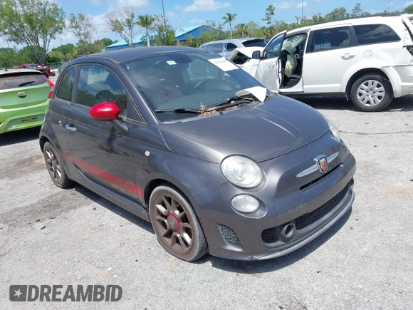 2015 FIAT 500 Abarth with VIN 3C3CFFFH2FT507879, listed as a IAAI auction lot 42135649 with 163,663 mi miles. Bid and sale history available at carsss.com. Image 1.