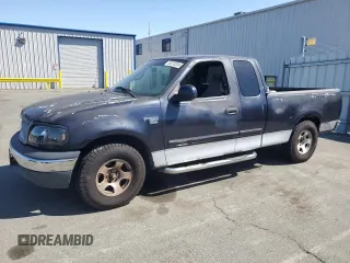 1999 Ford F-150 z VIN 1FTRX17W0XKA49801, wystawiony jako Copart lot #59223395 z przebiegiem Nie podano mil oraz Czysty tytuł • Clean title. Historia ofert i sprzedaży dostępna na DreamBid. Obrazek 1.