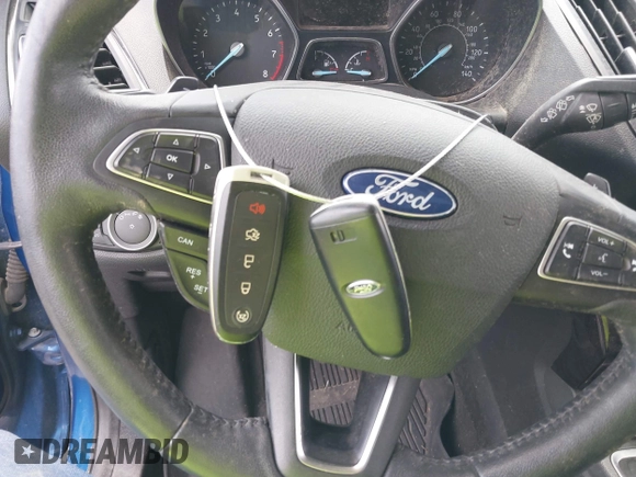 2018 Ford Escape Titanium with VIN 1FMCU9J99JUB94925, listed as a IAAI auction lot 42412800 with 95,880 mi miles and . Bid and sale history available at DreamBid. Image 11.