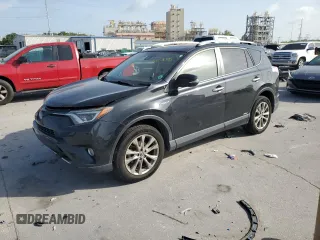 2016 Toyota RAV4 Limited with VIN JTMDJREV1GD013351, listed as a Copart auction lot 60057045 with 127,355 mi miles and Salvage title. Bid and sale history available at DreamBid. Image 1.