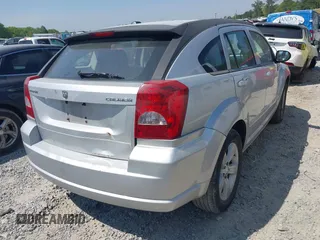 2011 Dodge Caliber Mainstreet with VIN 1B3CB3HAXBD107494, listed as a IAAI auction lot 42071328 with 146,936 mi miles. Bid and sale history available at carsss.com. Image 4.