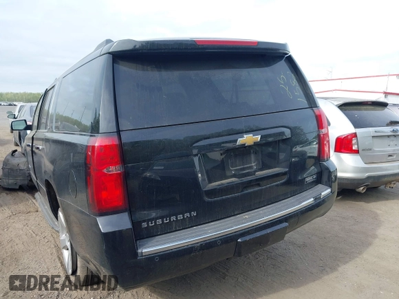 2015 Chevrolet Suburban LTZ with VIN 1GNSKKKC6FR637086, listed as a IAAI auction lot 42104826 with 79,986 mi miles and . Bid and sale history available at DreamBid. Image 16.