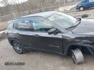 2019 Jeep Compass Latitude with VIN 3C4NJDBB1KT839413, listed as a IAAI auction lot 41437378 with 66,595 mi miles and . Bid and sale history available at DreamBid. Image 13.