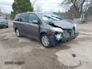 2014 Toyota Sienna XLE with VIN 5TDYK3DC0ES422700, listed as a IAAI auction lot 42049181 with 147,498 mi miles. Bid and sale history available at carsss.com. Image 1.