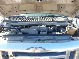 2013 Ford Econoline Cargo Van Commercial with VIN 1FTNE2EWXDDA24465, listed as a IAAI auction lot 41747959 with 228,246 mi miles. Bid and sale history available at carsss.com. Image 10.