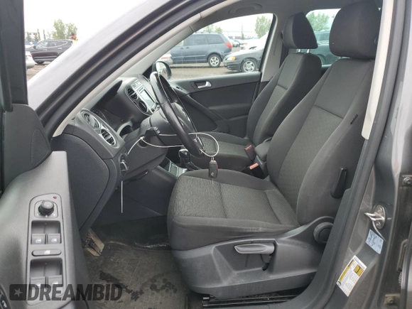 2017 Volkswagen Tiguan with VIN WVGHV7AX1HK017717, listed as a Copart auction lot 64948373 with 77,825 mi miles and Salvage title. Bid and sale history available at DreamBid. Image 7.