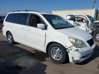 2005 Honda Odyssey EX with VIN 5FNRL38465B081716, listed as a IAAI auction lot 41998956 with 173,182 mi miles and . Bid and sale history available at carsss.com. Image 1.