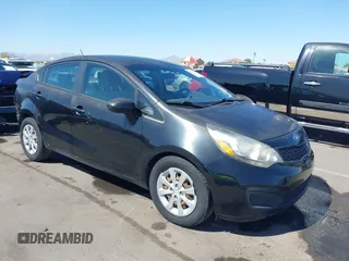 2014 Kia Rio LX with VIN KNADM4A39E6364490, listed as a IAAI auction lot 42128702 with 130,981 mi miles and . Bid and sale history available at DreamBid. Image 1.