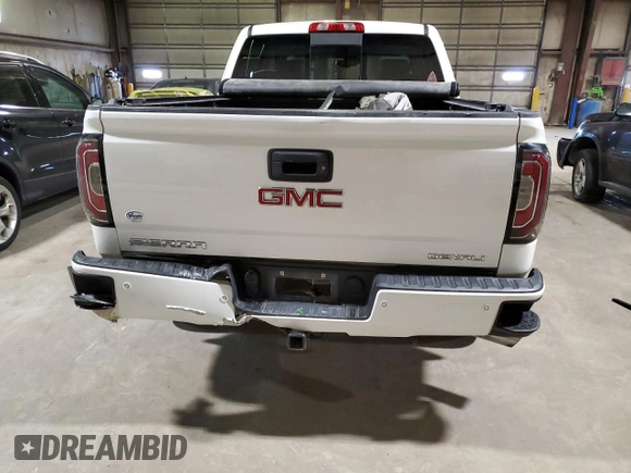 2017 GMC Sierra 1500 Denali with VIN 3GTU2PEJ2HG331787, listed as a Copart auction lot 82601664 with 112,008 mi miles and Salvage Title. Bid and sale history available at DreamBid. Image 6.