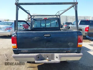 1997 Ford Ranger XLT z VIN 1FTCR10A4VTA44803, wystawiony jako IAAI lot #42479081 z przebiegiem 162 346 mil mil oraz . Historia ofert i sprzedaży dostępna na DreamBid. Obrazek 16.