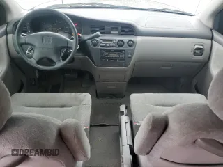 2000 Honda Odyssey EX with VIN 2HKRL1865YH513885, listed as a Copart auction lot 50223505 with 214,627 mi miles and Salvage Title. Bid and sale history available at DreamBid. Image 8.