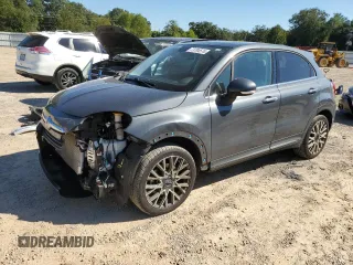 2018 FIAT 500X Lounge with VIN ZFBCFXDB5JP664130, listed as a Copart auction lot 73784574 with 67,160 mi miles and Salvage title. Bid and sale history available at DreamBid. Image 1.