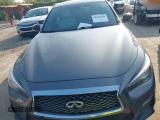 2020 Infiniti Q50 Red Sport 400 with VIN JN1FV7AR8LM660823, listed as a IAAI auction lot 40322341 with 104,530 mi miles and . Bid and sale history available at carsss.com. Image 12.