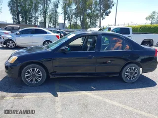 2003 Honda Civic LX with VIN JHMES16523S000517, listed as a IAAI auction lot 42012871 with 158,253 mi miles. Bid and sale history available at carsss.com. Image 14.