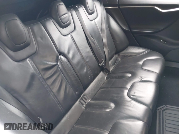 2013 Tesla Model S with VIN 5YJSA1CN1DFP07344, listed as a IAAI auction lot 42746574 with 181,538 mi miles and . Bid and sale history available at DreamBid. Image 8.