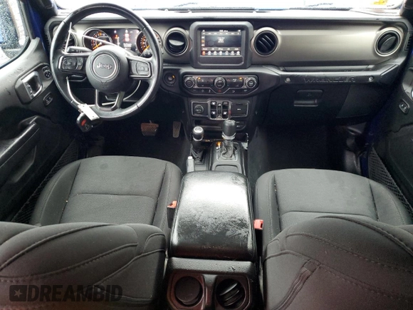 2018 Jeep Wrangler Unlimited Sport with VIN 1C4HJXDG3JW292810, listed as a Copart auction lot 57672705 with 106,378 mi miles and Salvage title. Bid and sale history available at DreamBid. Image 8.