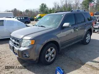 2011 Ford Escape Limited with VIN 1FMCU9EG6BKB01025, listed as a IAAI auction lot 42136708 with 210,349 mi miles. Bid and sale history available at carsss.com. Image 2.