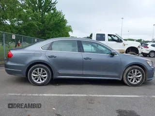 2016 Volkswagen Passat S with VIN 1VWAT7A30GC054210, listed as a IAAI auction lot 42452304 with 119,842 mi miles and . Bid and sale history available at DreamBid. Image 13.