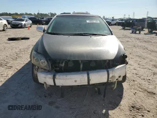 2009 Scion tC with VIN JTKDE167990297899, listed as a Copart auction lot 48591365 with 122,056 mi miles and Salvage Title. Bid and sale history available at carsss.com. Image 5.
