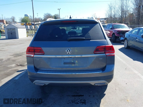 2018 Volkswagen Atlas SE with VIN 1V2CR2CA0JC571988, listed as a IAAI auction lot 41848862 with 96,426 mi miles and . Bid and sale history available at DreamBid. Image 16.