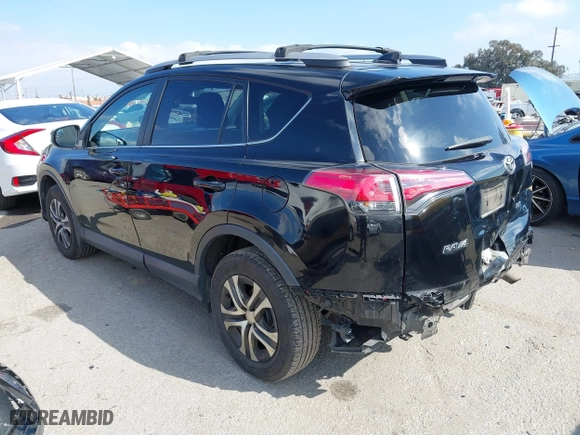 2018 Toyota RAV4 LE with VIN 2T3ZFREVXJW457751, listed as a IAAI auction lot 41529251 with 230,054 mi miles. Bid and sale history available at carsss.com. Image 3.