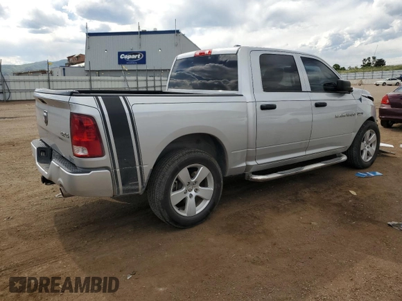 2012 Ram 1500 Express with VIN 1C6RD7KT1CS142370, listed as a Copart auction lot 60756925 with 106,627 mi miles and Salvage title. Bid and sale history available at DreamBid. Image 3.