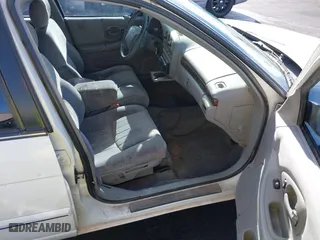 1997 Chevrolet Lumina with VIN 2G1WL52M4V9123059, listed as a IAAI auction lot 42058465 with 192,168 mi miles. Bid and sale history available at carsss.com. Image 5.