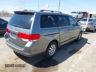 2009 Honda Odyssey EX-L with VIN 5FNRL38619B401970, listed as a IAAI auction lot 42017650 with 137,109 mi miles. Bid and sale history available at carsss.com. Image 4.