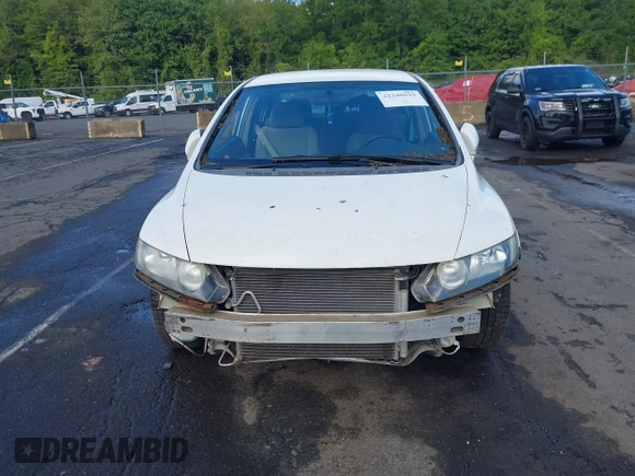 2009 Honda Civic LX z VIN 2HGFA16569H342000, wystawiony jako IAAI lot #42340919 z przebiegiem 214 370 mil mil oraz . Historia ofert i sprzedaży dostępna na DreamBid. Obrazek 13.