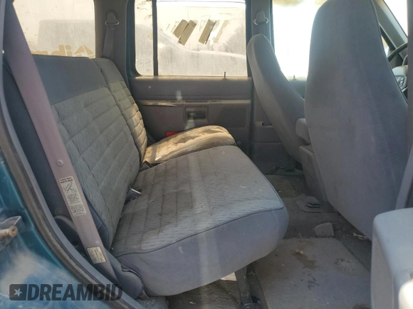 1994 Ford Explorer Eddie Bauer z VIN 1FMDU34X2RUD14846, wystawiony jako Copart lot #69321834 z przebiegiem 223 648 mil mil oraz Czysty tytuł • Clean title. Historia ofert i sprzedaży dostępna na DreamBid. Obrazek 11.