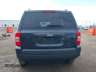 2014 Jeep Patriot Sport with VIN 1C4NJPBB6ED906017, listed as a IAAI auction lot 42097186 with 203,896 mi miles. Bid and sale history available at carsss.com. Image 16.