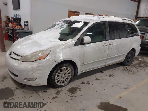 2007 Toyota Sienna XLE with VIN 5TDZK22C57S002919, listed as a IAAI auction lot 41563961 with 262,988 mi miles. Bid and sale history available at carsss.com. Image 2.